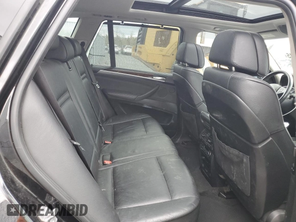 2012 BMW X5 35i z VIN 5UXZV4C5XCL752071, wystawiony jako Copart lot #56623145 z przebiegiem 180 161 mil mil oraz Czysty tytuł • Clean title. Historia ofert i sprzedaży dostępna na DreamBid. Obrazek 11.