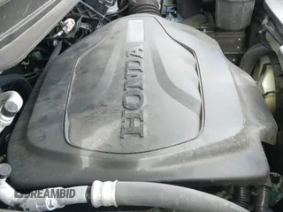 2023 Honda Passport Elite z VIN 5FNYF8H03PB000039, wystawiony jako IAAI lot #40593339 z przebiegiem 33 697 mil mil oraz . Historia ofert i sprzedaży dostępna na DreamBid. Obrazek 19.