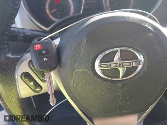 2014 Scion tC with VIN JTKJF5C78E3079618, listed as a IAAI auction lot 41107330 with 112,105 mi miles. Bid and sale history available at carsss.com. Image 11.