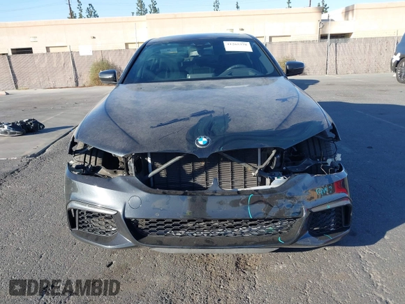 2019 BMW 5 Series M550i xDrive with VIN WBAJB9C51KB288416, listed as a IAAI auction lot 41265378 with 52,529 mi miles and . Bid and sale history available at DreamBid. Image 13.