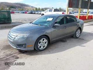 2011 Ford Fusion SE with VIN 3FAHP0HA7BR340296, listed as a IAAI auction lot 41860467 with 137,705 mi miles. Bid and sale history available at carsss.com. Image 2.