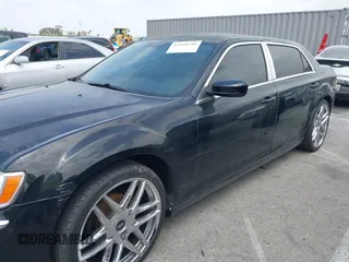 2013 Chrysler 300 with VIN 2C3CCAAG3DH565628, listed as a IAAI auction lot 42110710 with 204,362 mi miles. Bid and sale history available at carsss.com. Image 6.