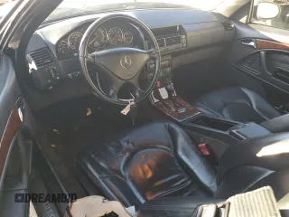1999 Mercedes-Benz SL-Class with VIN WDBFA68F0XF175888, listed as a Copart auction lot 85984514 with 97,975 mi miles and Salvage Title. Bid and sale history available at carsss.com. Image 8.