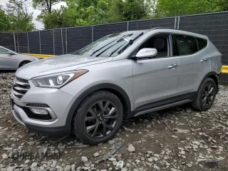 2017 Hyundai Santa Fe Ultimate with VIN 5XYZWDLAXHG435759, listed as a Copart auction lot 55336535 with 82,452 mi miles and Salvage title. Bid and sale history available at DreamBid. Image 1.