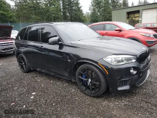 2015 BMW X5 M with VIN 5YMKT6C59F0C89697, listed as a Copart auction lot 80650234 with 50,367 mi miles and Salvage Title. Bid and sale history available at carsss.com. Image 4.
