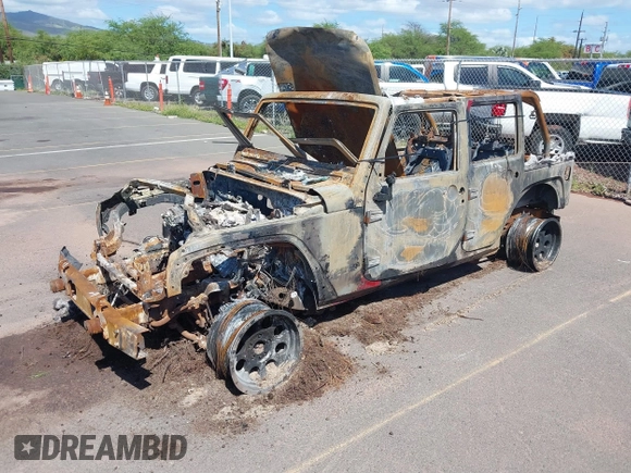 2015 Jeep Wrangler Unlimited Willys Wheeler with VIN 1C4BJWDG0FL751574, listed as a IAAI auction lot 41604064 with Not Provided miles and . Bid and sale history available at DreamBid. Image 2.