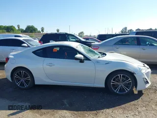 2016 Scion FR-S with VIN JF1ZNAA19G9709205, listed as a IAAI auction lot 42077281 with 68,549 mi miles. Bid and sale history available at carsss.com. Image 14.