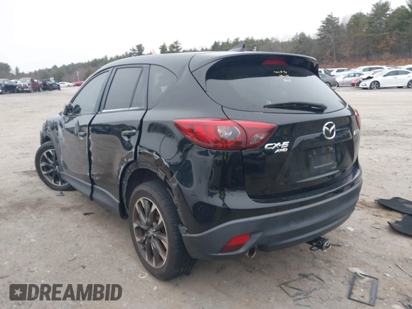 2016 Mazda CX-5 Grand Touring with VIN JM3KE4DY1G0685449, listed as a IAAI auction lot 41162840 with 134,525 mi miles. Bid and sale history available at carsss.com. Image 3.
