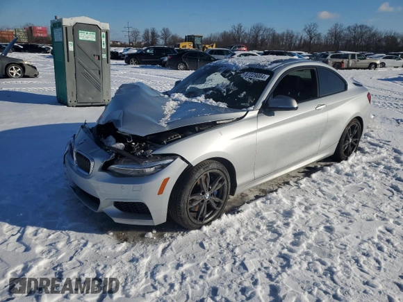 2016 BMW 2 Series M235i xDrive with VIN WBA1J9C50GV372199, listed as a Copart auction lot 87229084 with 0 mi miles and Salvage Title. Bid and sale history available at carsss.com. Image 1.