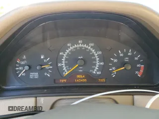 1997 Mercedes-Benz E-Class with VIN WDBJF72F0VA523161, listed as a Copart auction lot 77752804 with 143,495 mi miles and Salvage Title. Bid and sale history available at carsss.com. Image 9.