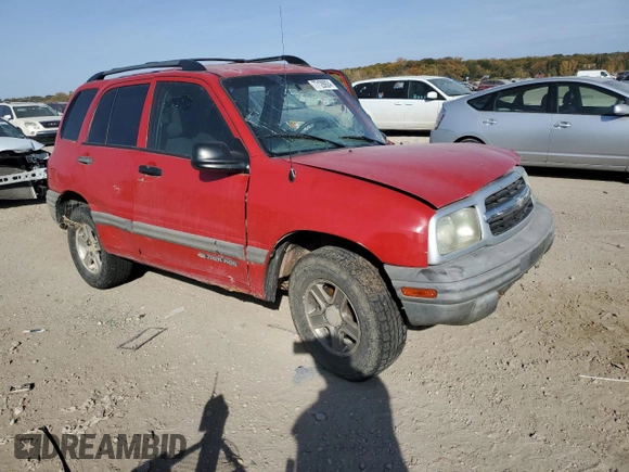 2004 Chevrolet Tracker with VIN 2CNBJ134846911647, listed as a Copart auction lot 77128924 with Not provided miles and Salvage title. Bid and sale history available at DreamBid. Image 4.