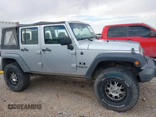 2008 Jeep Wrangler Unlimited X with VIN 1J4GA39198L651172, listed as a IAAI auction lot 41936521 with 69,007 mi miles and . Bid and sale history available at DreamBid. Image 13.