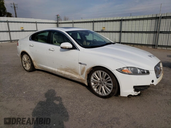 2012 Jaguar XF Portfolio with VIN SAJWA0HB4CLS36605, listed as a Copart auction lot 47179245 with 115,611 mi miles and Salvage Title. Bid and sale history available at carsss.com. Image 4.