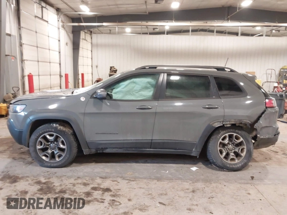 2019 Jeep Cherokee Trailhawk Elite with VIN 1C4PJMBX7KD361203, listed as a IAAI auction lot 41515943 with 133,384 mi miles. Bid and sale history available at carsss.com. Image 14.