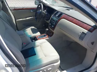 2006 Cadillac DTS 1SD z VIN 1G6KD57Y06U208812, wystawiony jako IAAI lot #42233924 z przebiegiem 120 244 mil mil oraz . Historia ofert i sprzedaży dostępna na DreamBid. Obrazek 5.