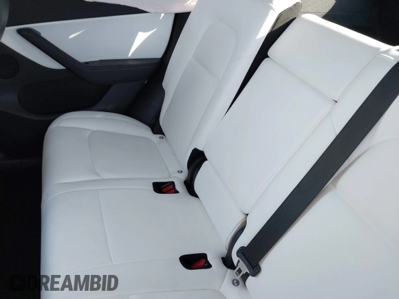 2021 Tesla Model Y Long Range with VIN 5YJYGDEE5MF203175, listed as a IAAI auction lot 41758334 with 63,387 mi miles and . Bid and sale history available at DreamBid. Image 8.
