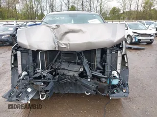 2013 Chevrolet Tahoe LT with VIN 1GNSCBE0XDR357490, listed as a IAAI auction lot 42013034 with Not provided miles and . Bid and sale history available at DreamBid. Image 6.