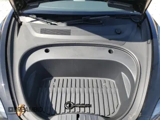 2023 Tesla Model 3 z VIN 5YJ3E1EA4PF658387, wystawiony jako Copart lot #54230795 z przebiegiem 25 078 mil mil oraz Szkoda całkowita • Salvage title. Historia ofert i sprzedaży dostępna na DreamBid. Obrazek 11.