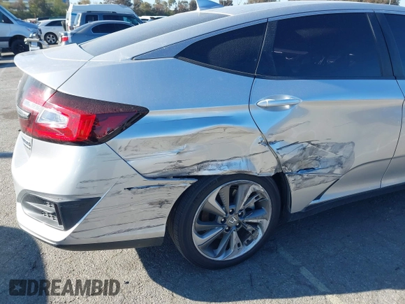 2019 Honda Clarity Touring z VIN JHMZC5F38KC003399, wystawiony jako IAAI lot #41818175 z przebiegiem 54 896 mil mil oraz . Historia ofert i sprzedaży dostępna na DreamBid. Obrazek 6.