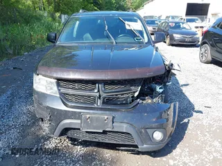 2013 Dodge Journey R/T with VIN 3C4PDDEG4DT691056, listed as a IAAI auction lot 42535196 with 198,307 mi miles and . Bid and sale history available at DreamBid. Image 6.