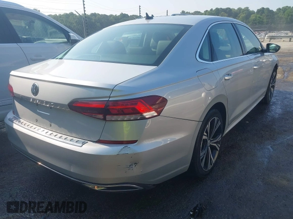 2021 Volkswagen Passat SE with VIN 1VWSA7A38MC012907, listed as a IAAI auction lot 42581889 with 76,001 mi miles and . Bid and sale history available at DreamBid. Image 4.