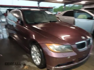 2006 BMW 3 Series 330xi with VIN WBAVD33526KV59403, listed as a IAAI auction lot 41908734 with 136,349 mi miles. Bid and sale history available at carsss.com. Image 1.