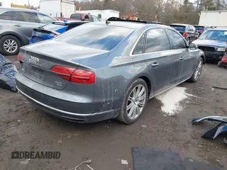 2015 Audi A8 L 4.0T with VIN WAU32AFD4FN041084, listed as a IAAI auction lot 41450453 with 86,199 mi miles. Bid and sale history available at carsss.com. Image 4.