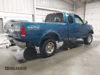 2000 Ford F-150 XL z VIN 1FTRX18L7YKB27657, wystawiony jako IAAI lot #42262373 z przebiegiem Nie podano mil oraz . Historia ofert i sprzedaży dostępna na DreamBid. Obrazek 4.