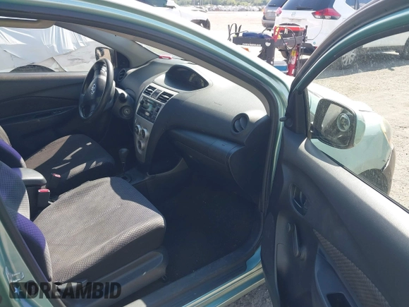2008 Toyota Yaris with VIN JTDBT923384015057, listed as a IAAI auction lot 41879099 with 184,995 mi miles. Bid and sale history available at carsss.com. Image 5.