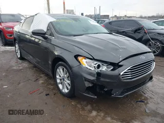 2020 Ford Fusion SE z VIN 3FA6P0LU6LR185721, wystawiony jako IAAI lot #41639827 z przebiegiem 63 857 mil mil oraz . Historia ofert i sprzedaży dostępna na DreamBid. Obrazek 1.