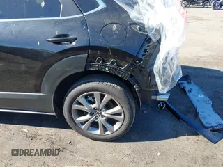 2024 Mazda CX-30 S Carbon Edition with VIN 3MVDMBCM4RM607530, listed as a IAAI auction lot 41796426 with 3,715 mi miles and . Bid and sale history available at DreamBid. Image 18.