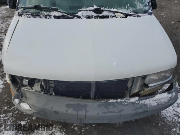2002 Chevrolet Astro Cargo z VIN 1GCDL19X62B131620, wystawiony jako Copart lot #86748144 z przebiegiem Nie podano mil oraz Szkoda całkowita • Salvage title. Historia ofert i sprzedaży dostępna na DreamBid. Obrazek 12.