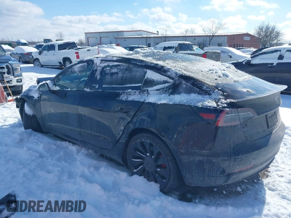 2023 Tesla Model 3 Performance with VIN 5YJ3E1EC7PF423161, listed as a IAAI auction lot 41566987 with 22,111 mi miles. Bid and sale history available at carsss.com. Image 3.