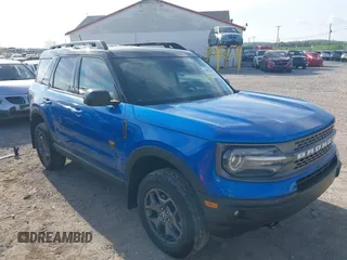 2022 Ford Bronco Sport Badlands z VIN 3FMCR9D90NRE11806, wystawiony jako IAAI lot #42092236 z przebiegiem 18 175 mil mil oraz . Historia ofert i sprzedaży dostępna na DreamBid. Obrazek 1.
