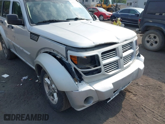 2010 Dodge Nitro SXT z VIN 1D4PU5GK8AW146087, wystawiony jako IAAI lot #42423104 z przebiegiem 220 381 mil mil oraz . Historia ofert i sprzedaży dostępna na DreamBid. Obrazek 6.
