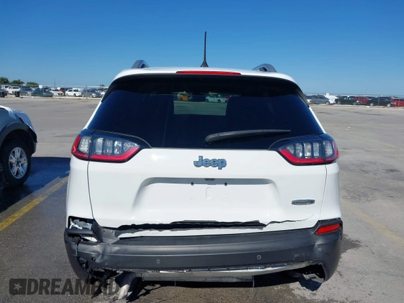 2021 Jeep Cherokee Altitude with VIN 1C4PJLLB5MD173828, listed as a IAAI auction lot 42234912 with 66,400 mi miles and . Bid and sale history available at DreamBid. Image 16.