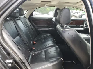 2018 Jaguar XJ with VIN SAJWA1C76J8W14271, listed as a Copart auction lot 73777914 with 124,155 mi miles and Salvage Title. Bid and sale history available at carsss.com. Image 10.
