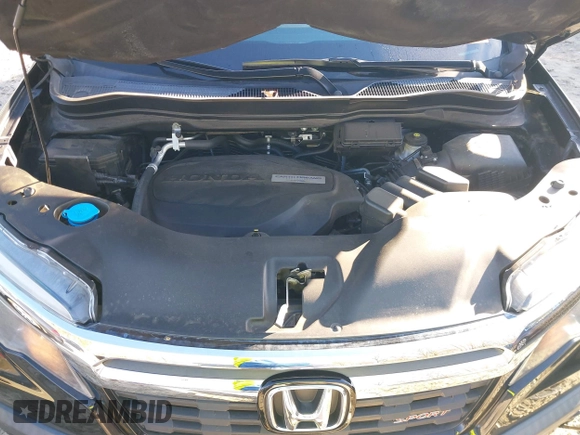 2019 Honda Ridgeline Sport with VIN 5FPYK2F12KB007990, listed as a IAAI auction lot 41828709 with 67,736 mi miles and . Bid and sale history available at DreamBid. Image 10.