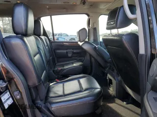 2014 Nissan Armada Platinum z VIN 5N1BA0NF8EN612889, wystawiony jako Copart lot #43404625 z przebiegiem 237 289 mil mil oraz Szkoda całkowita • Salvage title. Historia ofert i sprzedaży dostępna na DreamBid. Obrazek 11.