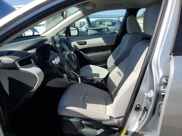 2022 Toyota Corolla Cross L with VIN 7MUAAABG0NV011057, listed as a Copart auction lot 50907545 with 59,328 mi miles and Salvage title. Bid and sale history available at DreamBid. Image 7.