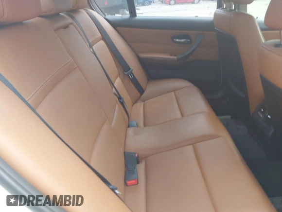 2011 BMW 3 Series 335i with VIN WBAPM5C51BE575704, listed as a IAAI auction lot 42005354 with 205,263 mi miles. Bid and sale history available at carsss.com. Image 8.