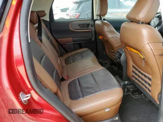 2021 Ford Bronco Sport Badlands z VIN 3FMCR9D96MRB05966, wystawiony jako Copart lot #58870785 z przebiegiem Nie podano mil oraz Tytuł czysty. Historia ofert i sprzedaży dostępna na DreamBid. Obrazek 11.
