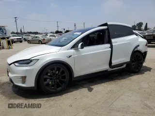 2017 Tesla Model X 90D with VIN 5YJXCAE26HF079421, listed as a Copart auction lot 47889005 with 88,281 mi miles and Salvage Title. Bid and sale history available at DreamBid. Image 1.