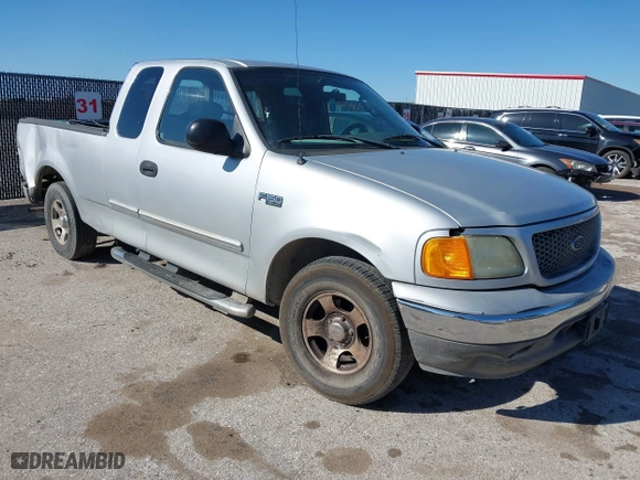 2004 Ford F-150 Heritage XL with VIN 2FTRX17244CA31380, listed as a IAAI auction lot 41753528 with 1 mi miles. Bid and sale history available at carsss.com. Image 1.