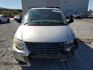 2005 Chrysler Town & Country Touring z VIN 2C4GP54L05R430233, wystawiony jako Copart lot #56189765 z przebiegiem 190 187 mil mil oraz Szkody całkowita. Historia ofert i sprzedaży dostępna na DreamBid. Obrazek 5.