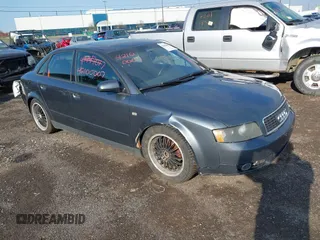 2002 Audi A4 1.8T z VIN WAULC68E52A172607, wystawiony jako IAAI lot #42100007 z przebiegiem 211 950 mil mil oraz . Historia ofert i sprzedaży dostępna na DreamBid. Obrazek 1.