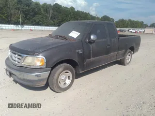 1999 Ford F-150 XL with VIN 1FTRX17L0XNA01154, listed as a IAAI auction lot 42417690 with 334,508 mi miles and . Bid and sale history available at DreamBid. Image 2.