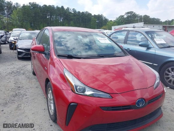 2021 Toyota Prius L Eco with VIN JTDKAMFU7M3147346, listed as a IAAI auction lot 41979206 with 55,267 mi miles. Bid and sale history available at carsss.com. Image 1.
