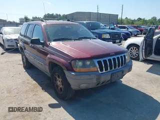 2000 Jeep Grand Cherokee Laredo with VIN 1J4G248S6YC332289, listed as a IAAI auction lot 42250175 with 210,556 mi miles and . Bid and sale history available at DreamBid. Image 1.
