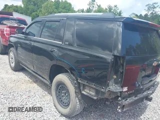 2015 Chevrolet Tahoe LTZ z VIN 1GNSCCKC8FR121461, wystawiony jako IAAI lot #42407901 z przebiegiem 137 729 mil mil oraz . Historia ofert i sprzedaży dostępna na DreamBid. Obrazek 3.
